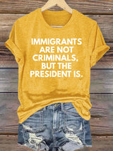 Women's  IMMIGRANTS ARE NOT CRIMINALS, BUT THE PRESIDENT IS. T-Shirt