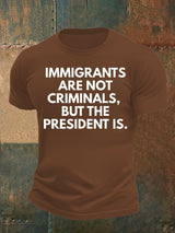 Men's  IMMIGRANTS ARE NOT CRIMINALS, BUT THE PRESIDENT IS. T-Shirt
