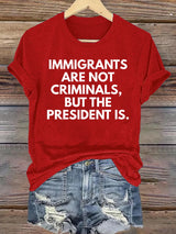 Women's  IMMIGRANTS ARE NOT CRIMINALS, BUT THE PRESIDENT IS. T-Shirt